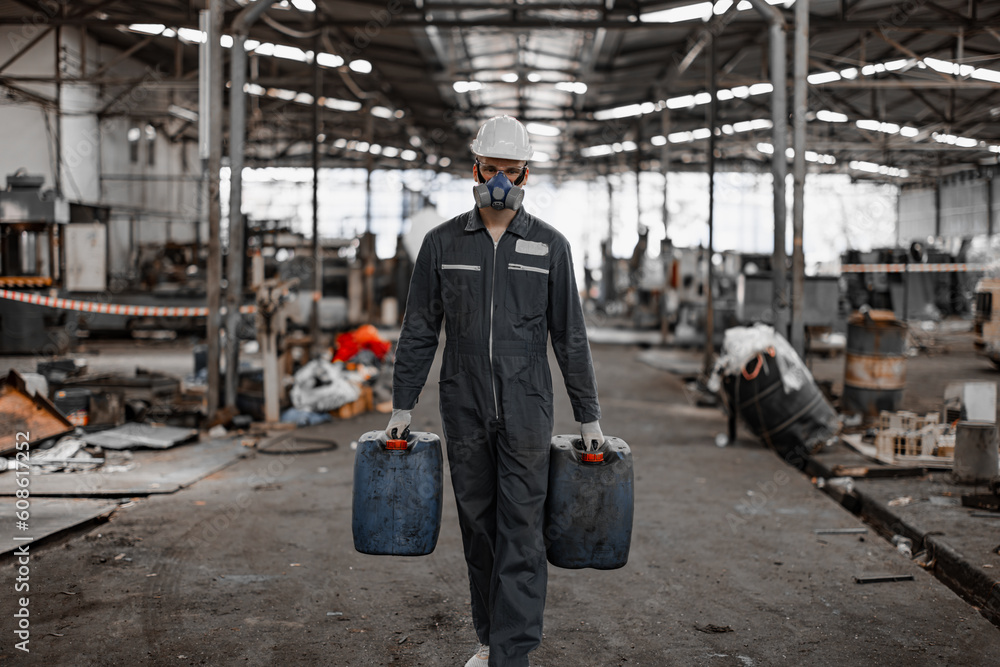 Fototapeta premium Industrial waste inspector examines the correct storage of hazardous chemicals, radioactive materials, toxic substances. Analyzing impact of factory's existing projects, suggesting solutions