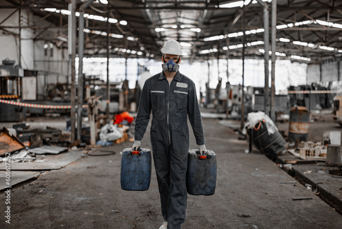 Industrial waste inspector examines the correct storage of hazardous chemicals, radioactive materials, toxic substances. Analyzing impact of factory's existing projects, suggesting solutions