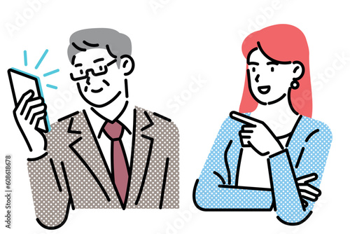A middle-aged man and a young woman checking their smartphones