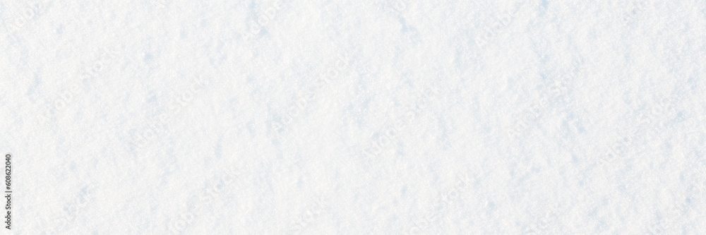 Natural snow texture. Smooth surface of clean fresh snow. Snowy ground. Wide panoramic winter background with snow patterns. Perfect for Christmas and New Year design. Closeup top view.