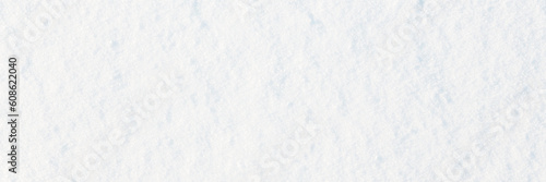 Natural snow texture. Smooth surface of clean fresh snow. Snowy ground. Wide panoramic winter background with snow patterns. Perfect for Christmas and New Year design. Closeup top view.