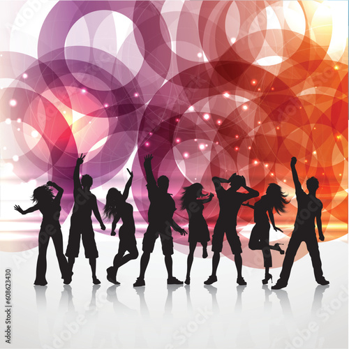silhouettes of people dancing on an abstract background