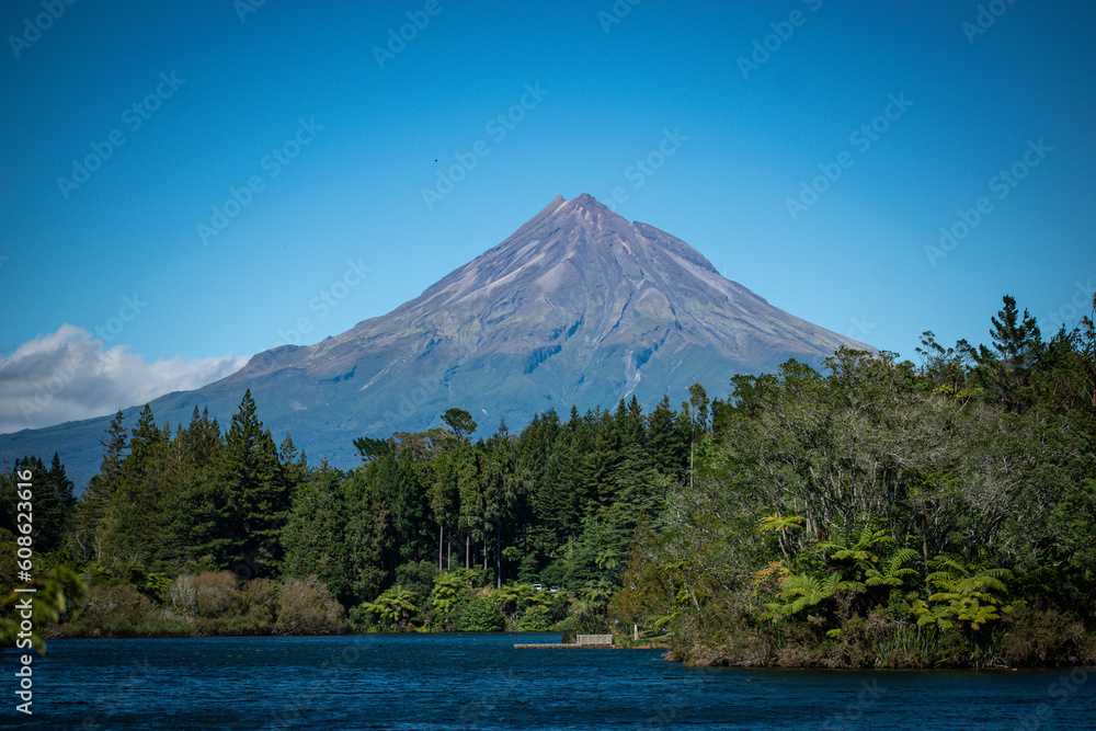 New Zealand, Mount Taranaki is the symmetrical volcanic cone that rises from sea level to 8,260 ft (2,518 m). This mountain is located in Egmont National Park, North Island of the New Zealand.