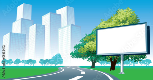 Blank billboard and roadside trees at the road, cityscape in the background.