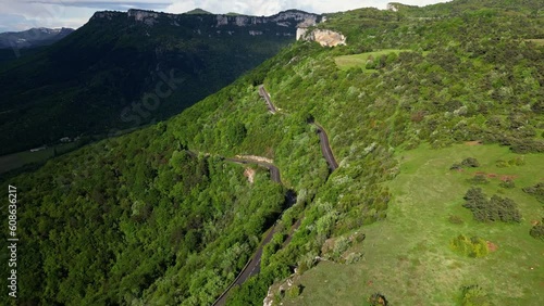 French countryside. Panoramic drone view of tree-covered hillsides of the heights of the Vercors, the marly hills and the valley Val de Drome, France photo