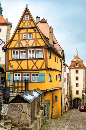 Colourful street of Rothenburg ob der Tauber, Plönlein, the Franconia region of Bavaria, Germany. Medieval old town. The most romantic town in Germany.