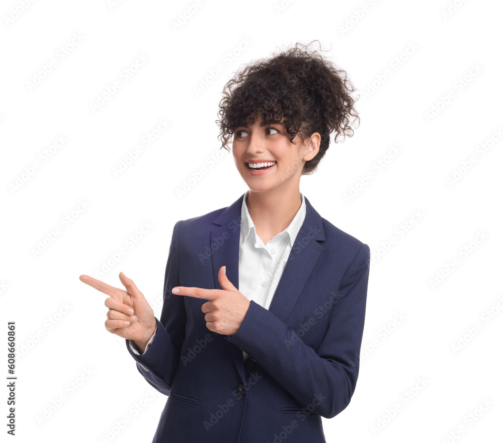 Beautiful businesswoman in suit pointing at something on white background Beautiful businesswoman in suit pointing at something on white background