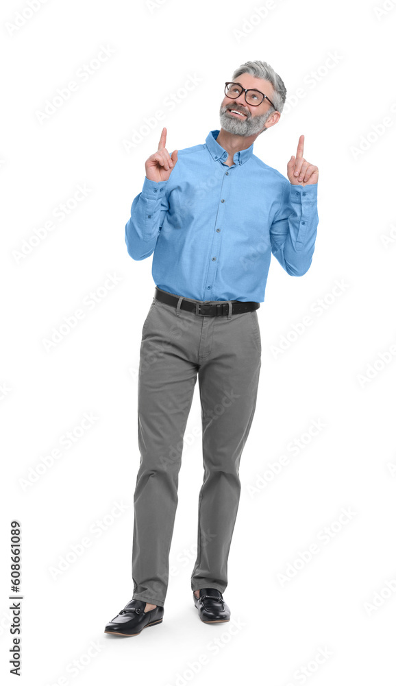 Mature businessman in stylish clothes posing on white background Mature businessman in stylish clothes posing on white background
