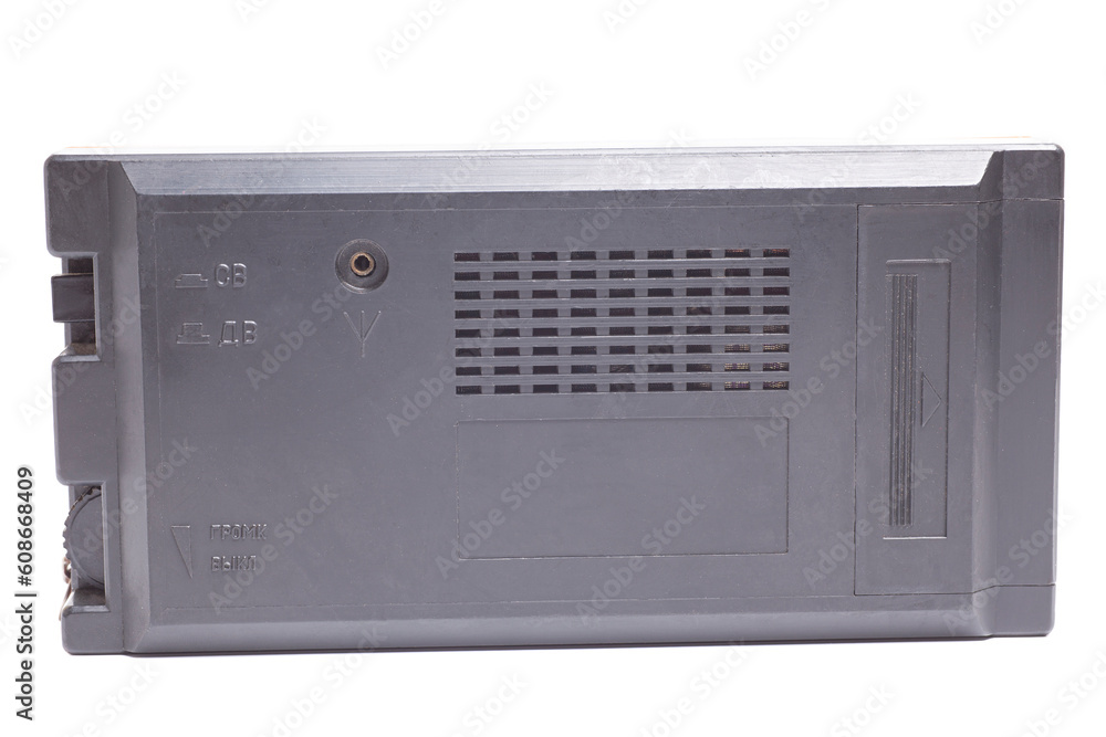 Obraz premium Old transistor radio isolated on white rear view.