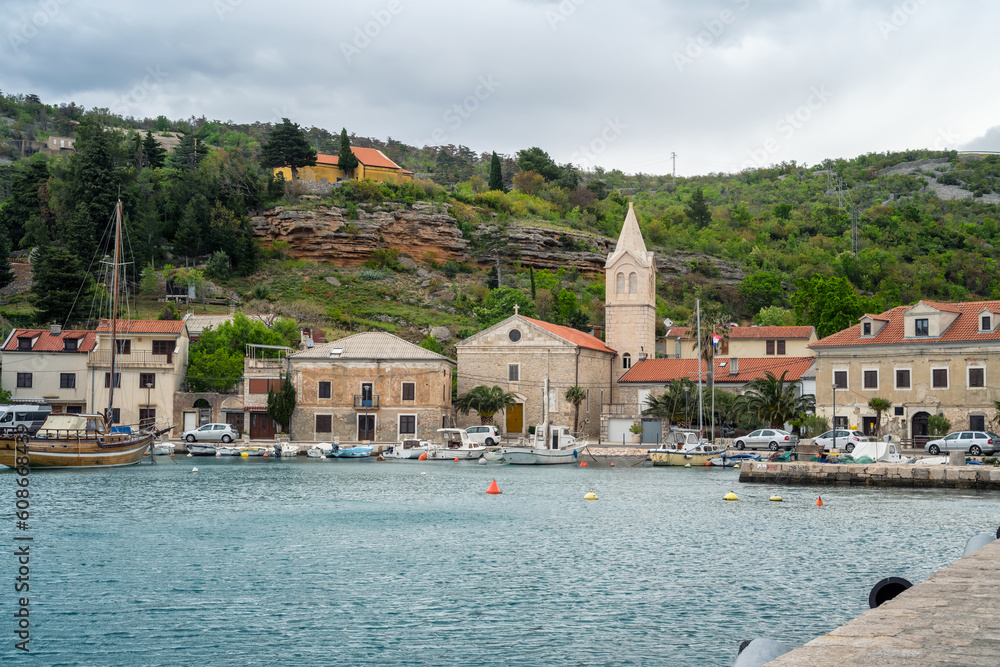 Picturesque view with town of Jablanac in coast of Adriatic sea in Croatia on a cloudy spring day