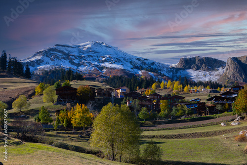 Autumn view in Savsat. Artvin, Turkey. Beautiful autumn landscape in Bazgiret Maden Village. Colorful fall nature view with snowy mountains background. © Samet