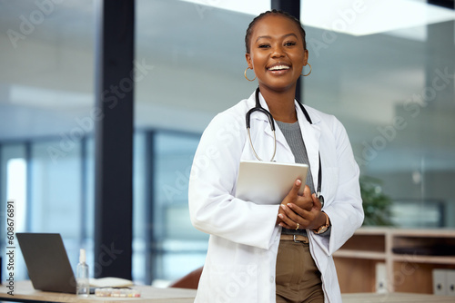 Portrait, doctor and black woman with a tablet, smile and connection with innovation, network and happiness. Face, female person and medical professional with technology, healthcare and happiness