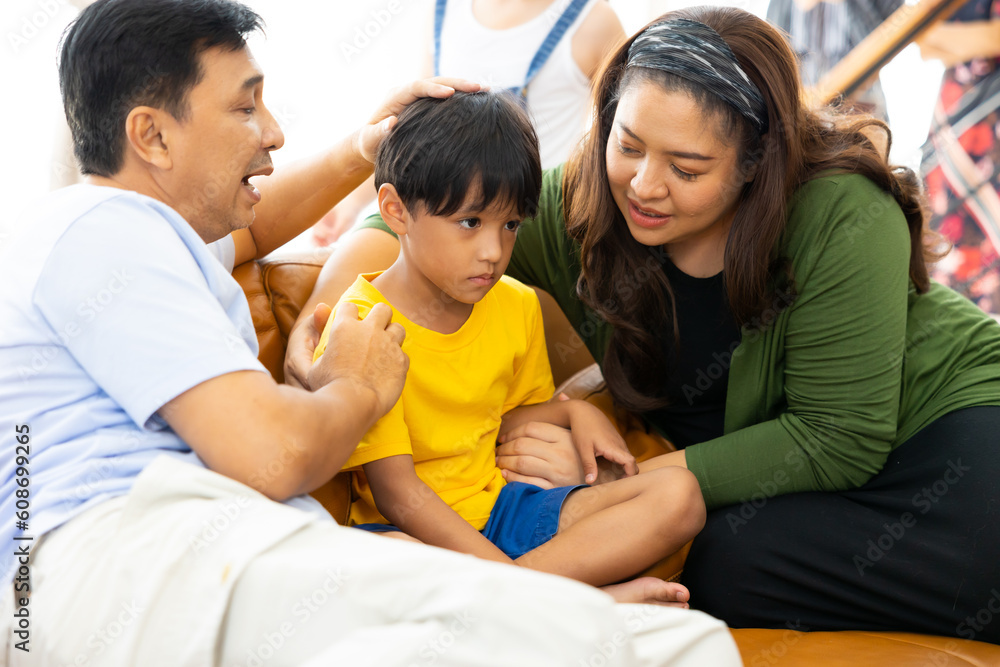 Together living room at home. Happy caucasian family parents relaxing leisure time in living room at home. Together living room at home. Happy caucasian family parents relaxing leisure time in living room at home.