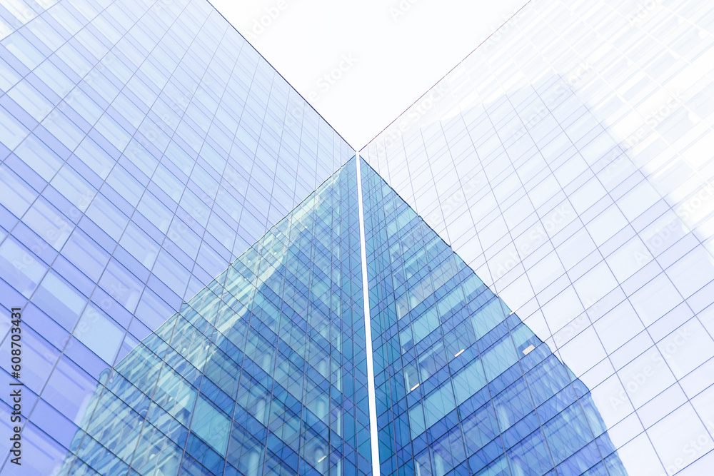 Modern building with glass walls in city district Modern building with glass walls in city district