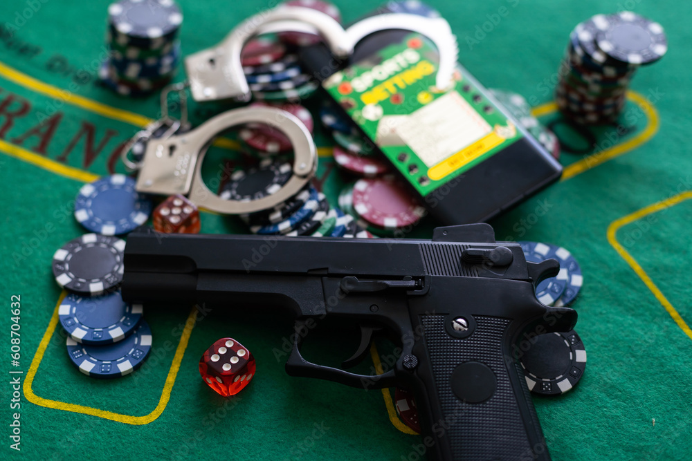 smartphone with sports betting, handcuffs, gun gambling shoot smartphone with sports betting, handcuffs, gun gambling shoot