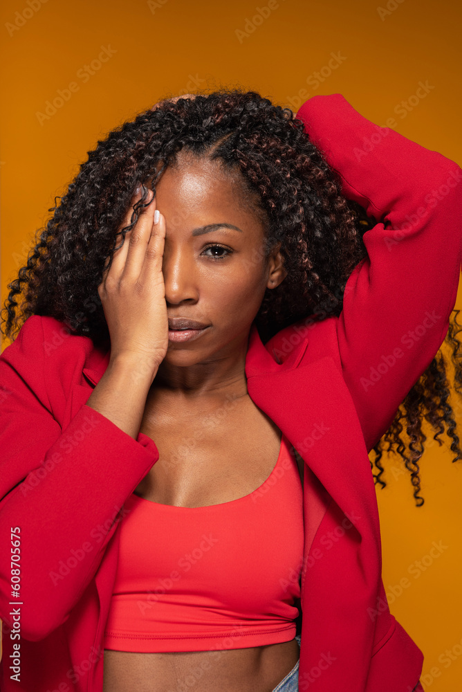 Sensual woman with curly hair in red clothes Sensual woman with curly hair in red clothes