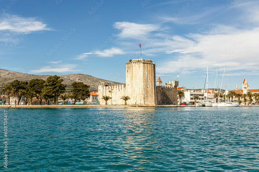 View at Trogir and  at castle Gradina Kamerlengo from the adriatic sea in Croatia in early spring
