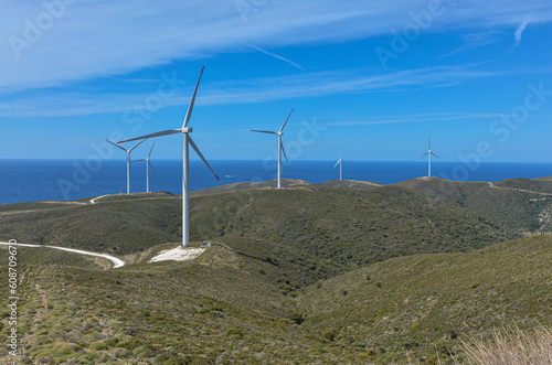 windmills of Sarpincik wind farm on the hills of Karaburun Peninsula (Parlak, Izmir province, Turkiye) photo