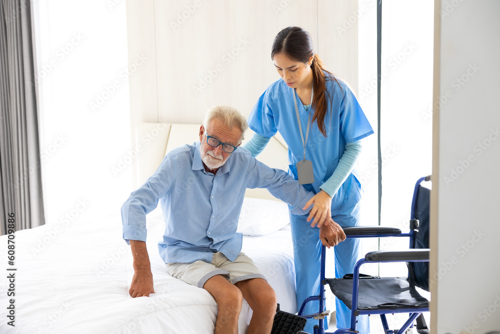 Female Nurse assisting senior patient at nursing home. Home care. disabled old man with walker at home. Professional caregiver nursing home Female Nurse assisting senior patient at nursing home. Home care. disabled old man with walker at home. Professional caregiver nursing home