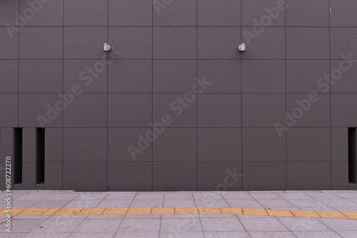 street wall background ,Industrial background, empty grunge urban street with warehouse brick wall