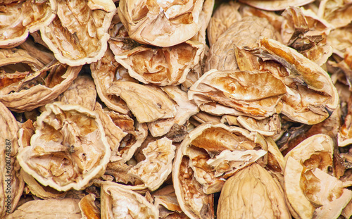 Pile heap of cracked walnut shells