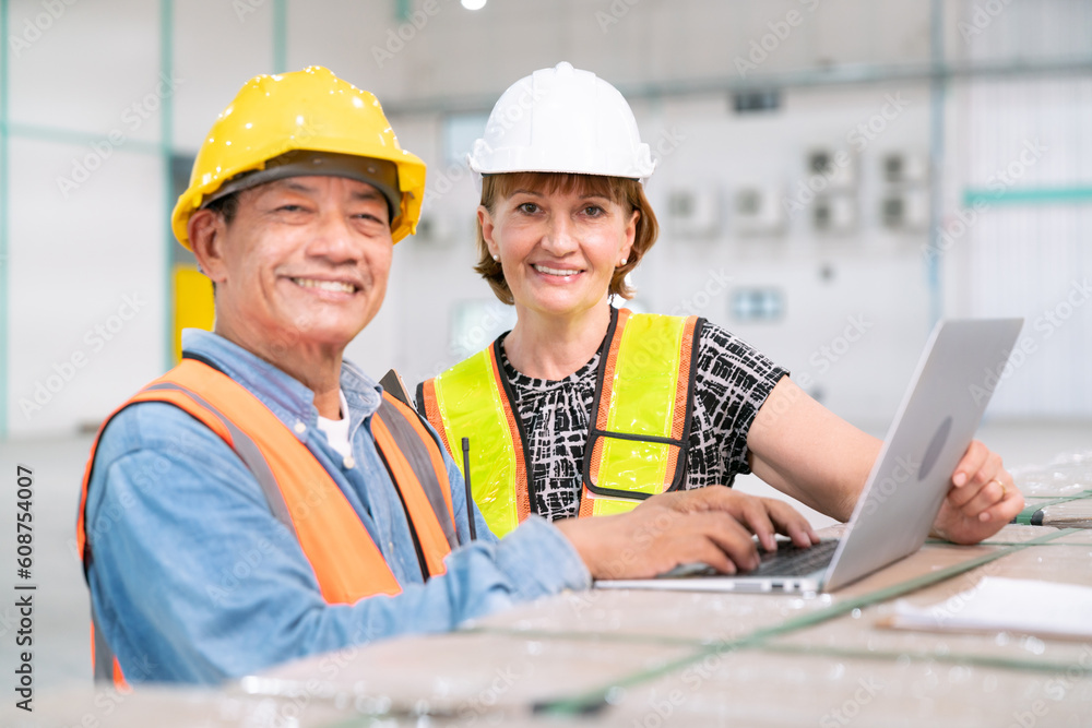 senior woman business manager with warehouse programmer software engineer work with professional service data computer in storage warehouse of storage and transportation logistic senior woman business manager with warehouse programmer software engineer work with professional service data computer in storage warehouse of storage and transportation logistic