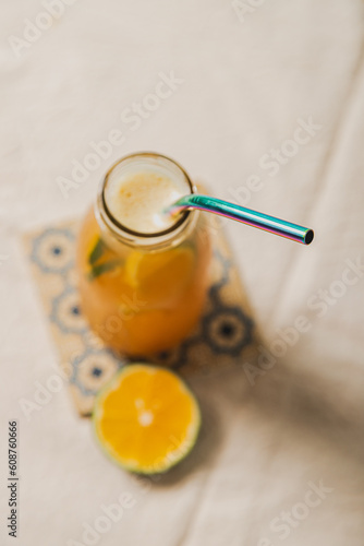 refreshing cold drink with metal straw
