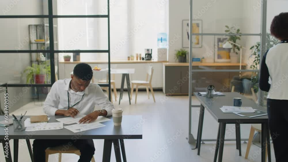 Businesspeople working in modern office Businesspeople working in modern office