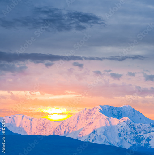 snowbound mountain chain at the sunrise, early morning mountain scene