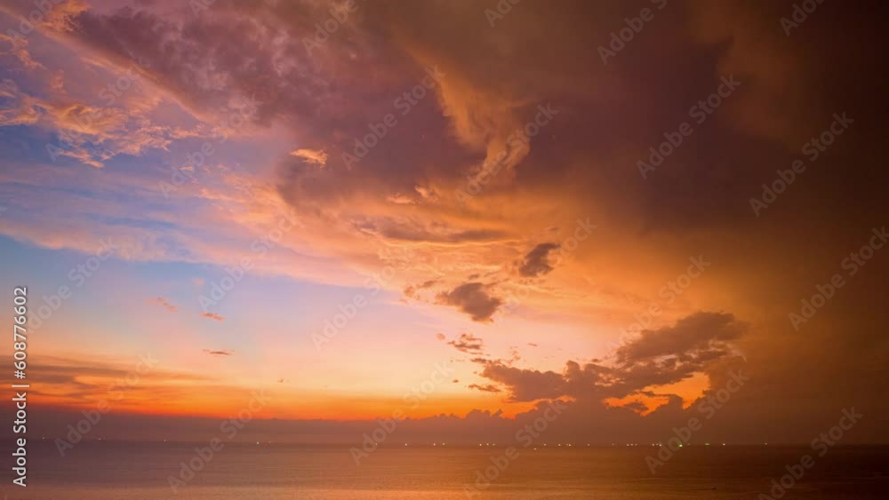 .Watching the sky in time lapse reveals the ever changing movement of the clouds, .the gradual changes in light as the time passes..The orange clouds moved and changed their color to red. .Watching the sky in time lapse reveals the ever changing movement of the clouds, .the gradual changes in light as the time passes..The orange clouds moved and changed their color to red.