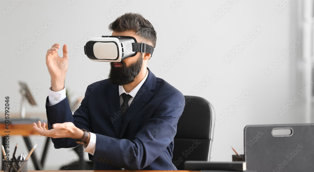 Businessman with virtual reality glasses in office Businessman with virtual reality glasses in office