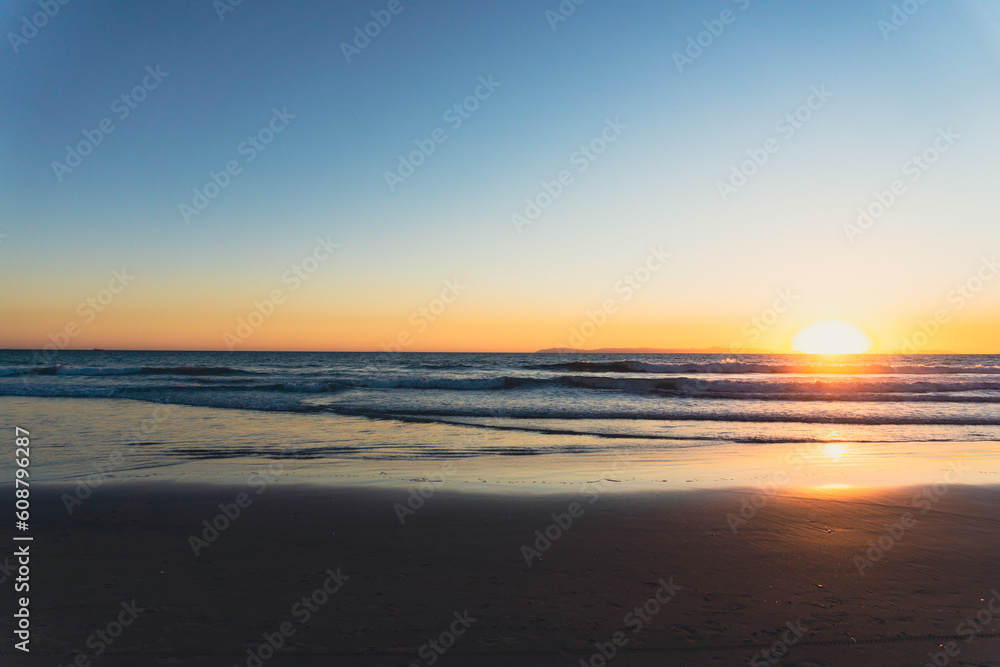 Low angle view of a sunset on the beach Low angle view of a sunset on the beach