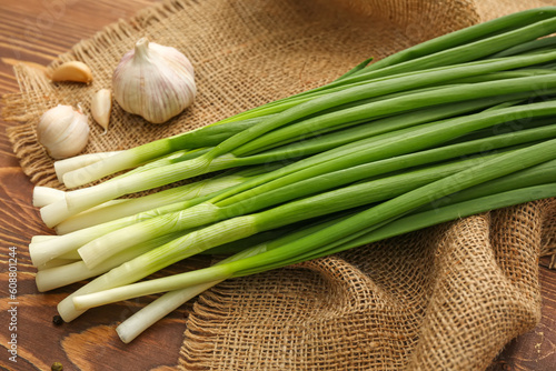Fresh green onion on table