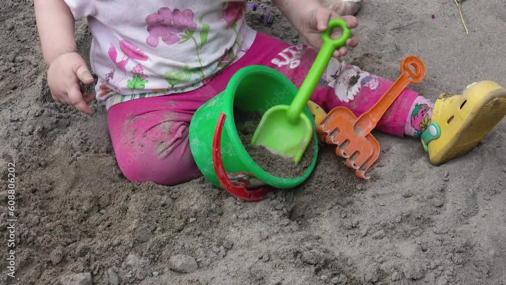 Child playing with sand