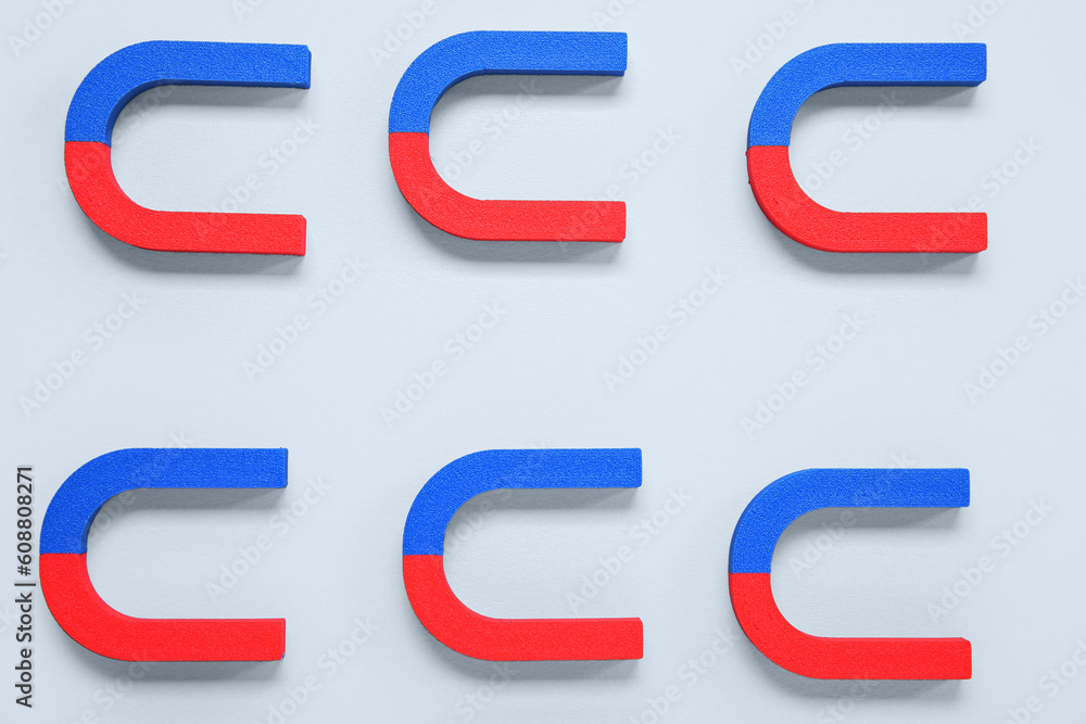 Horseshoe shaped magnets on white background Horseshoe shaped magnets on white background