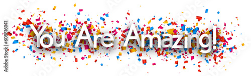 You are amazing sign on colorful cut ribbon confetti background.