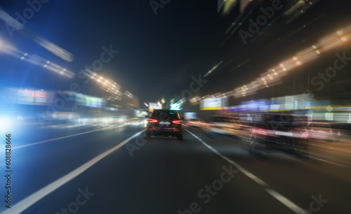 Night traffic on the road in the city center