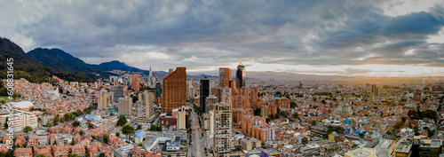 Aerial view of the seventh race that crosses the center of Bogotá in Colombia, movement of cars, transmilenium and houses around, near the business center.