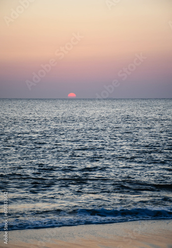 The sun sets on Sunset Beach in Cape May, NJ