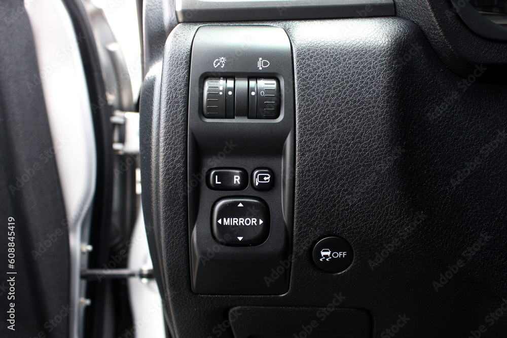 Rear view mirror control units in the new car. Side mirrors control
