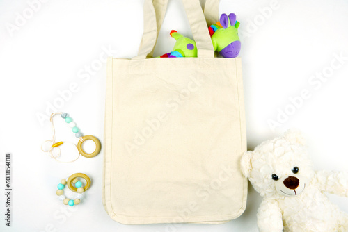 Tote Bag mockup on white background. Eco-friendly, reusable canvas carry bag. Baby carry-all theme.