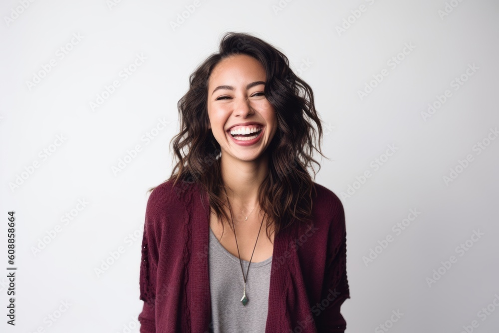 Portrait of a happy young woman laughing isolated on a white background Portrait of a happy young woman laughing isolated on a white background