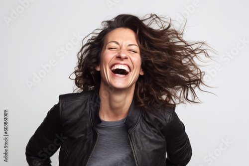 Lifestyle portrait photography of a pleased woman in her 40s that is placed against a white background . Generative AI
