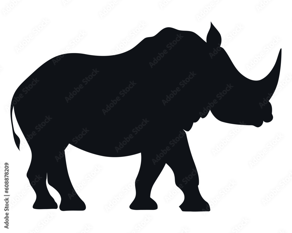 Silhouette of rhinoceros grazing in African plain