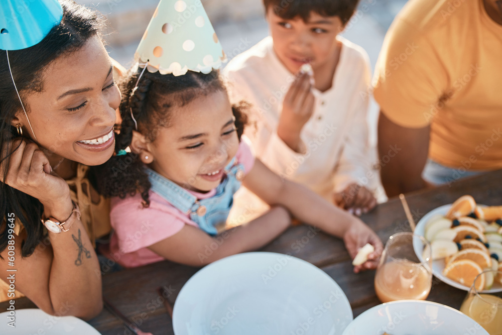 Obraz premium Birthday, mother and children with food in park for event, celebration and party outdoors together. Family, fun social gathering and happy mother with kids at picnic with cake, presents and snacks