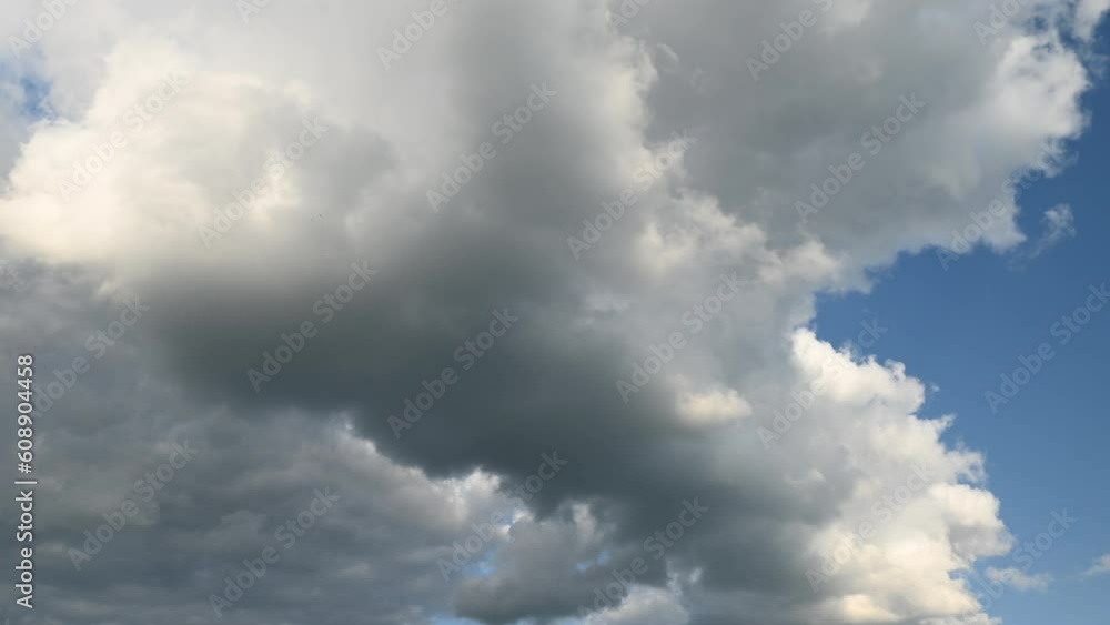 Clouds running over sky in summer day Clouds running over sky in summer day