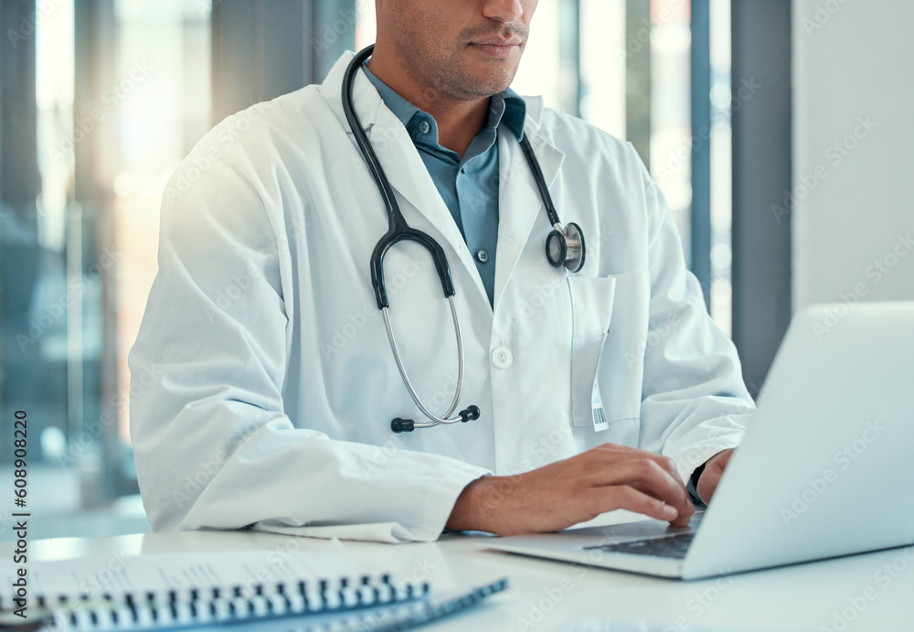 Laptop, doctor hands and man typing for research, healthcare or telehealth in wellness hospital. Computer, medical professional or person with email, online consultation or writing health information Laptop, doctor hands and man typing for research, healthcare or telehealth in wellness hospital. Computer, medical professional or person with email, online consultation or writing health information