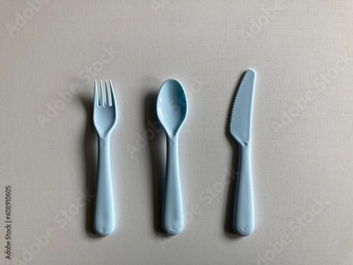 fork  spoon  and knife. plastic cutlery isolated on white background