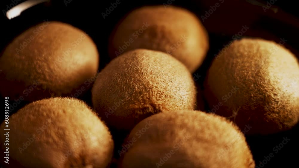 Close up of kiwi fruits rotating on a black background in 4K. Close up of fresh and tasty kiwi 4k Close up of kiwi fruits rotating on a black background in 4K. Close up of fresh and tasty kiwi 4k