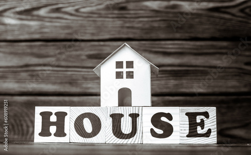 Wooden home and text on the cubes house 